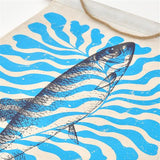 Canvas bag with fish and wave design on a white background