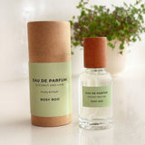Eau de Parfum bottle and packaging with 'Rosy Roo' branding on a light background.