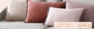 Soft beige velvet cushion with a delicate ruffled edge, showcasing KHEE's elegant homeware.