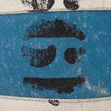 Abstract art piece with black and blue shapes on a textured background