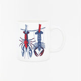 Mug with red and blue lobster design on a white background