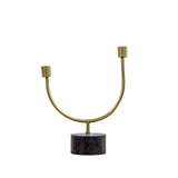 This stunning contemporary candlestick features a black marble base and aluminium candlesticks with a gold finish. 